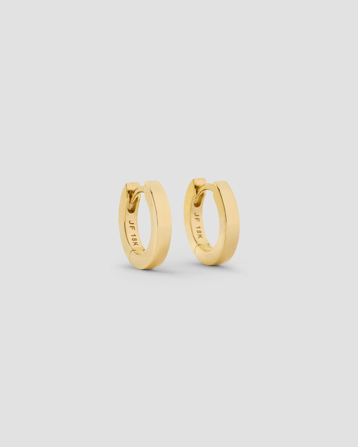 18k Extra Small Huggie earring - front view | gold huggie earrings